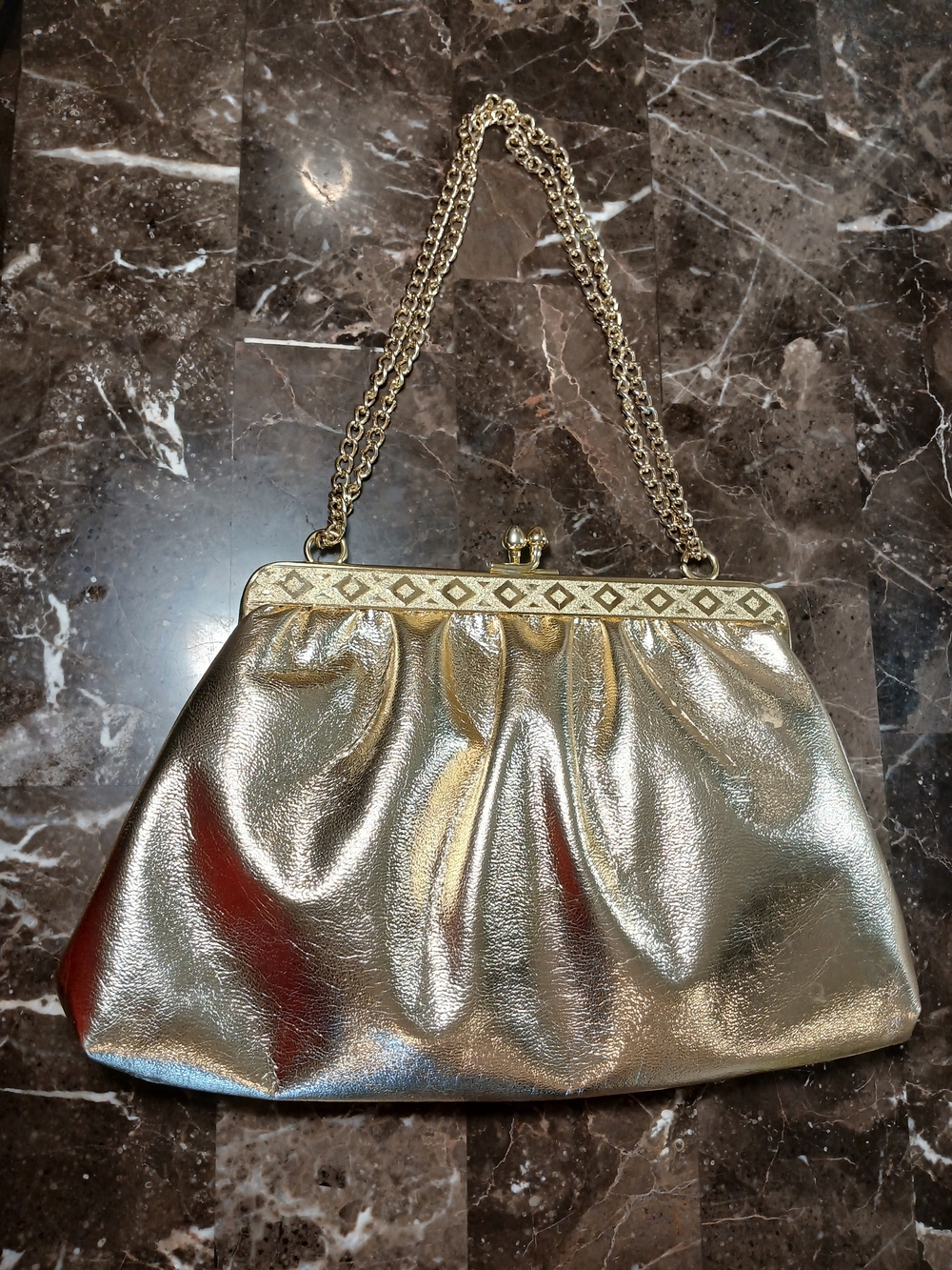 Gold metallic clutch purse with chain strap